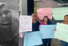 Família de borracheiro morto a facadas faz protesto por Justiça em frente à DEHS, em Manaus